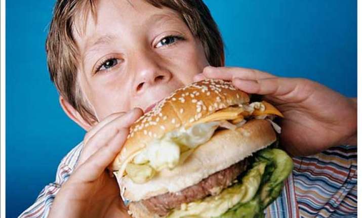 junk food causing puberty to hit at age 6 experts