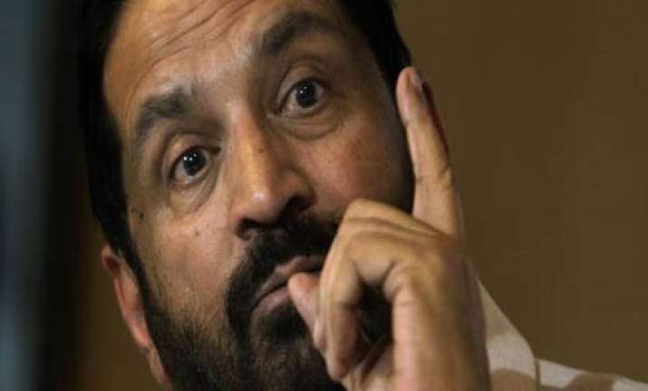 pm warns wrongdoers as kalmadi points finger at sports