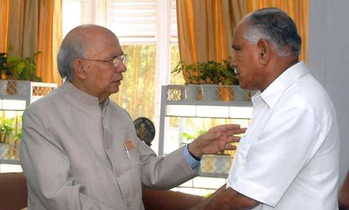 karnataka crisis home ministry examining governor s report