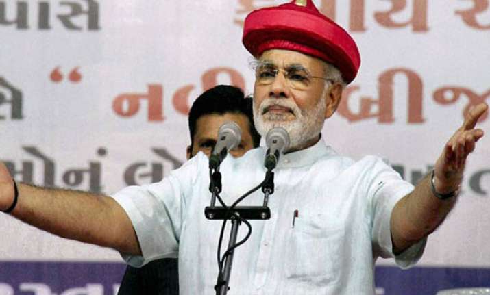 kashmir furiously debates modi s rise and rise