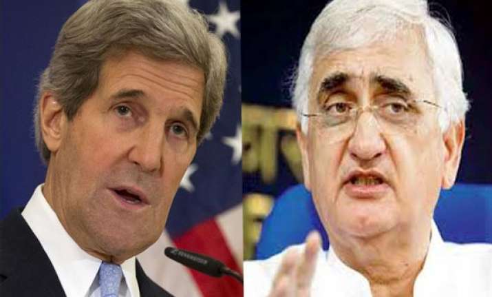 khurshid kerry begin talks