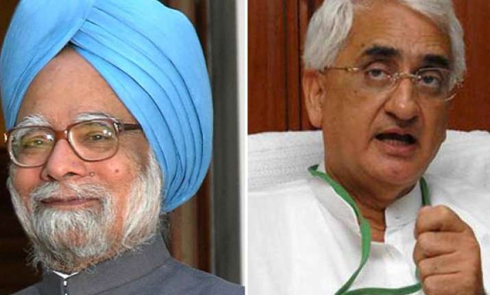 khurshid speaks to pm after ec complains to president