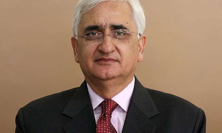 khurshid tightlipped on ec s move against him