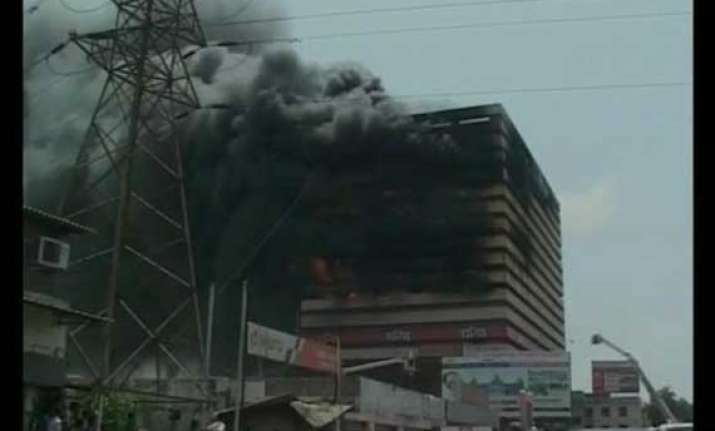 fire at commercial building in surat brought under control