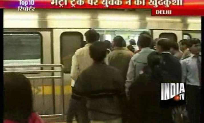 man jumps before metro train