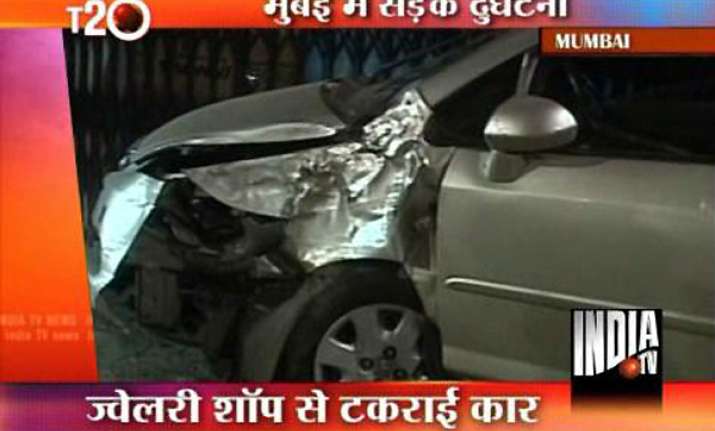 man runs over honda city car over mumbai pavement rams into