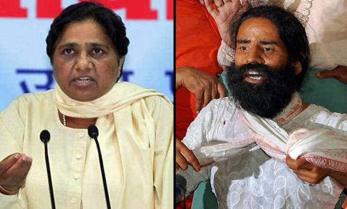 mayawati demands sc probe into police action on ramdev