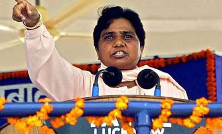 mayawati lashes out at bjp over booklet on fake scams