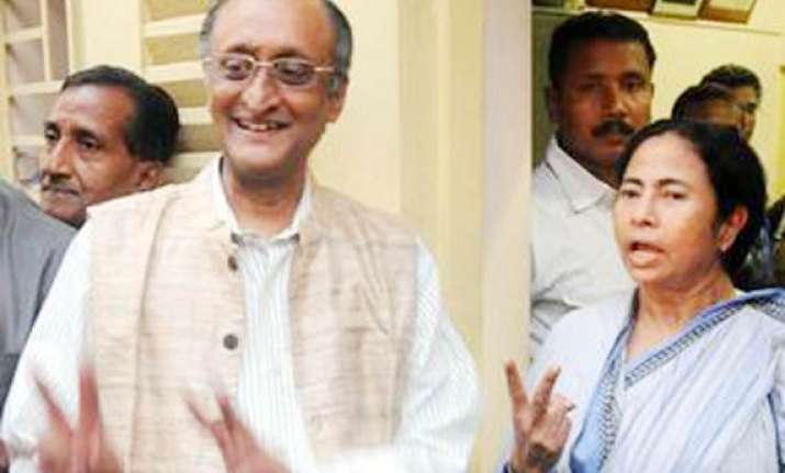 mitra gets finance former naxal leader gets labour