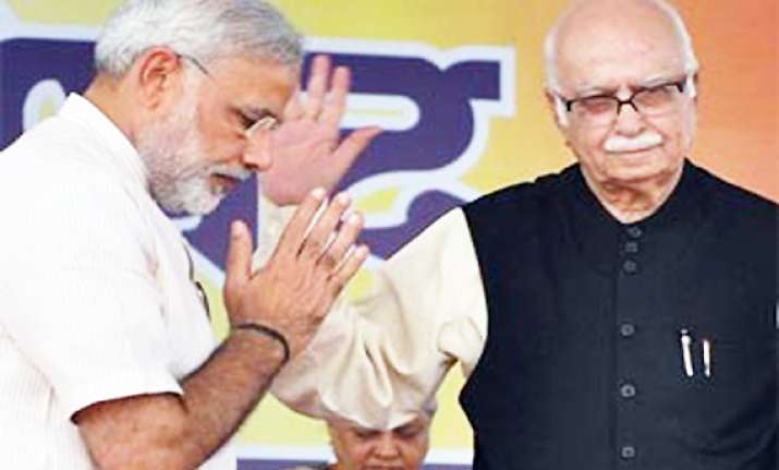 modi breaks silence on tiff with advani praises yatra