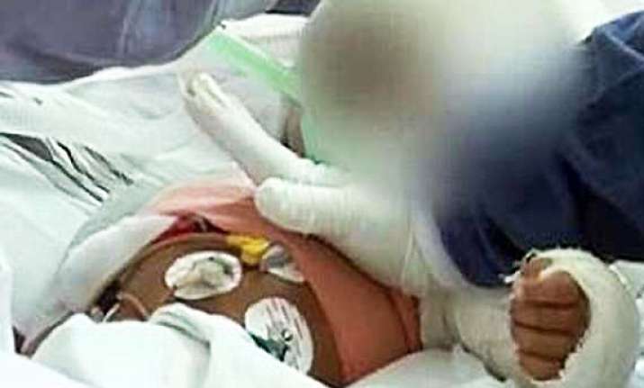 mother reunited with battered baby falak