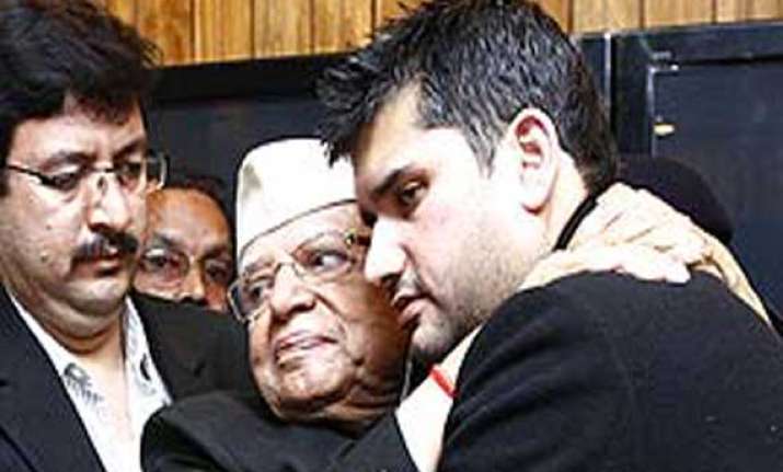 n d tiwari does a road show with son rohit shekhar in