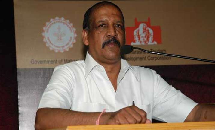 ncp sacks maharashtra minister after daughter gets bjp