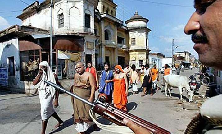 hanumangarhi temple one killed as seers shoot each other in