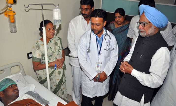 pm visits terror hit hyderabad lends healing touch