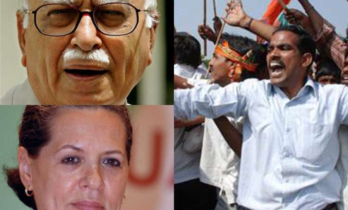 pm sonia should make telangana a reality by new year advani