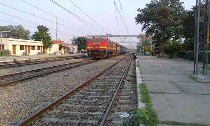 part of foot overbridge falls on train in bihar