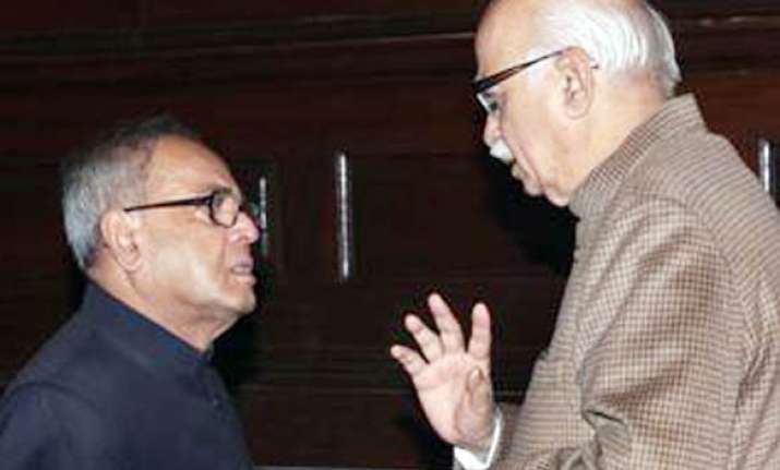 pranab takes potshots at advani s yatra