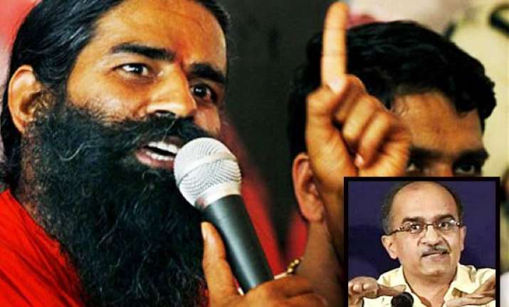 prashant bhushan objects to sadhvi sharing dais with ramdev