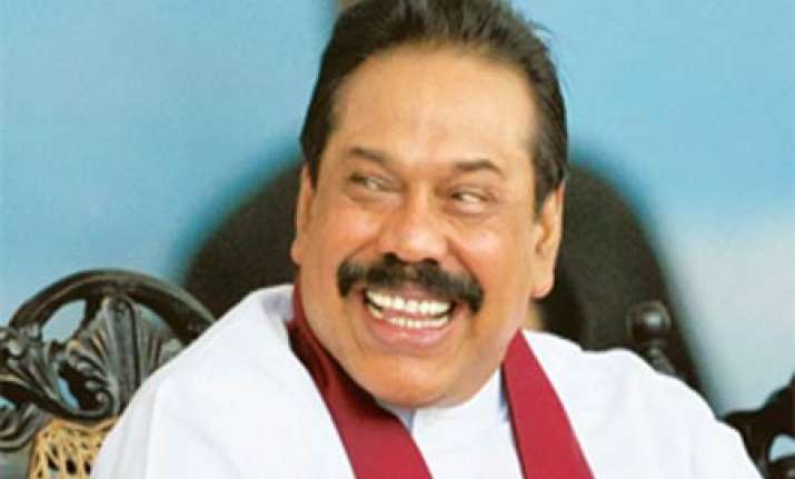 rajapaksa prays before balaji in tirupati