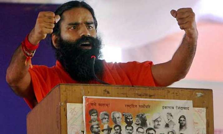 outrage against ramdev s remarks fir filed yoga guru regrets