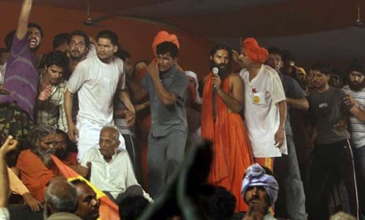 ramdev says his fast continues gives call for black day