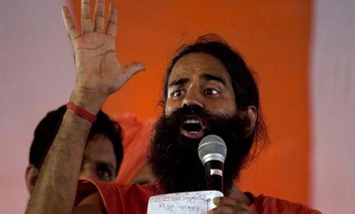 ramdev launches indefinite fast against black money