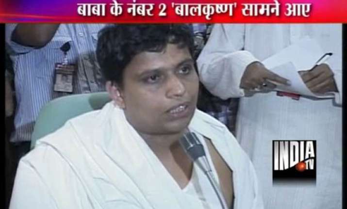ramdev s aide balkrishna denies allegations against him