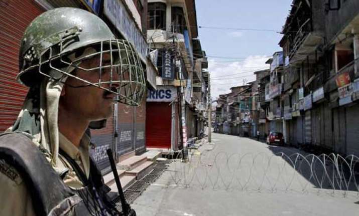 restrictions imposed in parts of srinagar as pm modi flags
