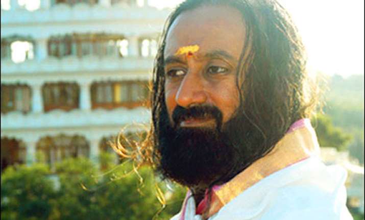rethink needed on telangana bill issue sri sri ravi shankar