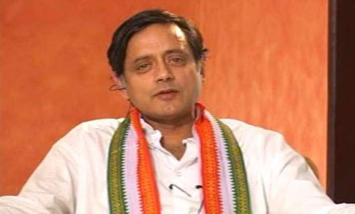 shashi tharoor files defamation suit against sunday indian