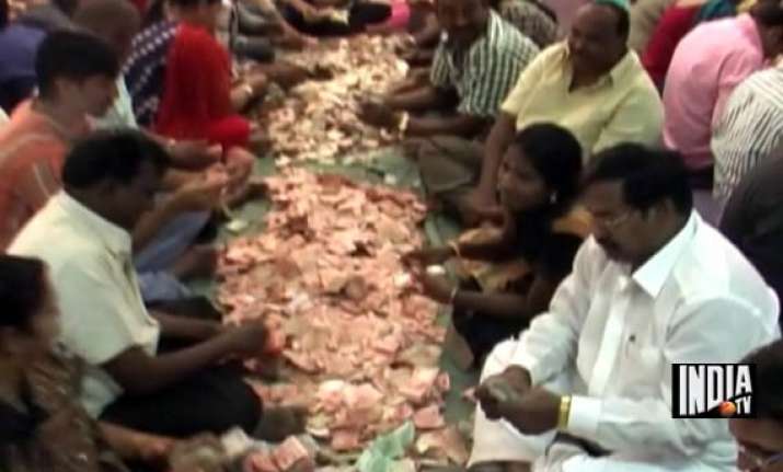 shirdi sai baba gold silver cash pour in as donations from