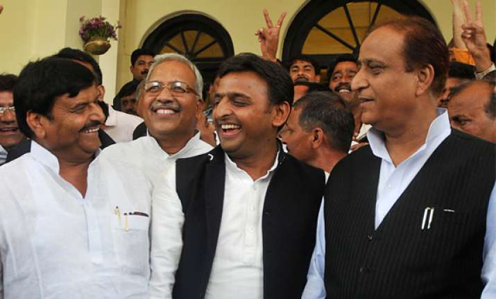 shivpal azam khan may take oath with akhilesh