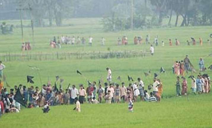singur farmers celebrate issue of ordinance to return land