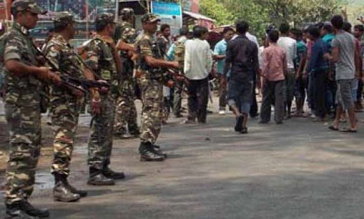 suspected of being an informer teenager shot dead in front