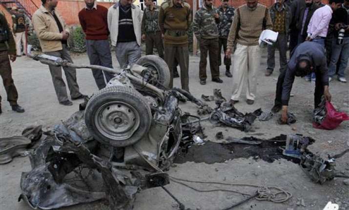 suspected militant killed 20 people injured in j k car blast