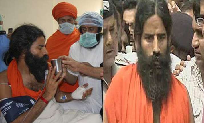 ramdev discharged from hospital vows to carry on campaign