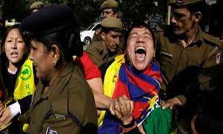 tibetans protest chinese foreign minister s visit