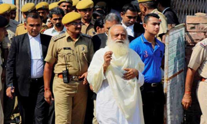 trial in asaram s case to continue even in his absence court