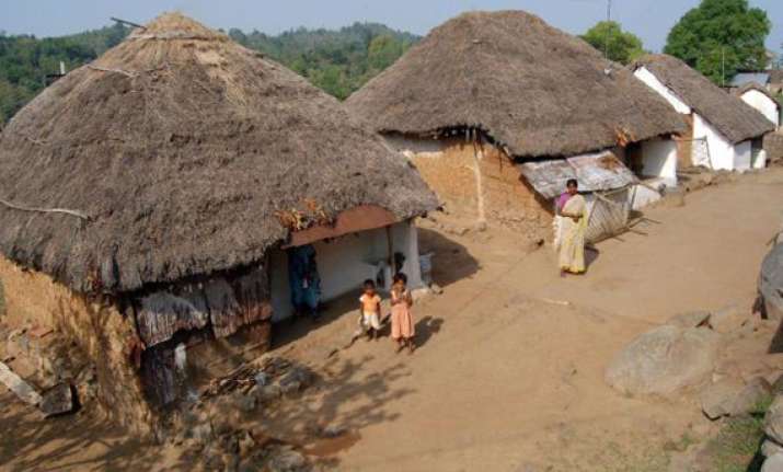 tribals accuse cops of thrashing them