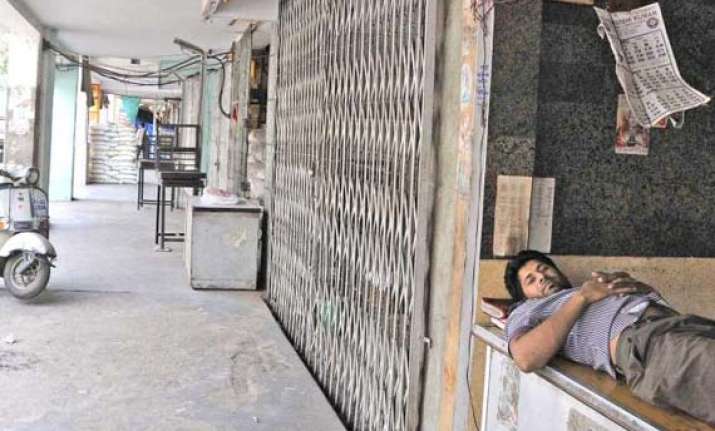 striking workers resort to arson in noida nationwide bandh