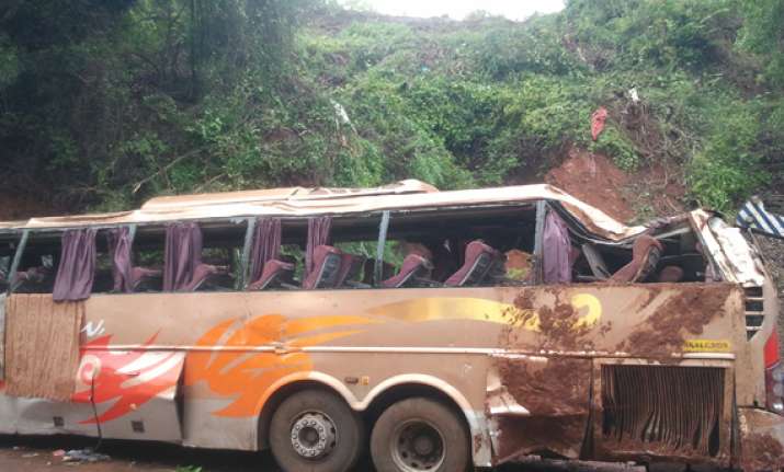2 killed as mumbai goa tourist volvo bus falls on hilly