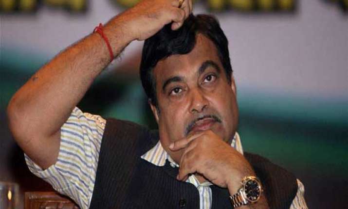 aap demands change of nitin gadkari s portfolio