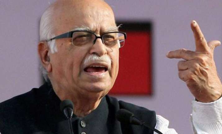 advani praises modi chouhan