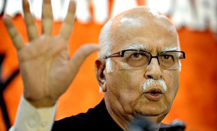 advani criticizes arrest of iac activist for tweeting