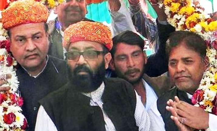 amar criticises cong for inducting ajit singh in union