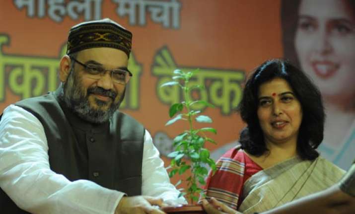 amit shah asks bjp women workers to highlight government s