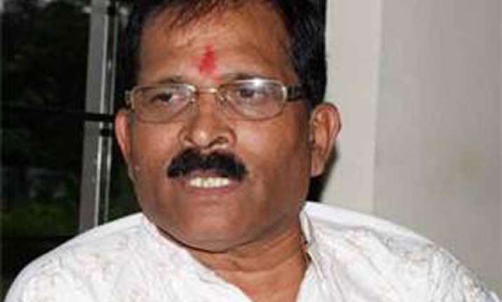 bjp mp in trouble for posing with bible in goa