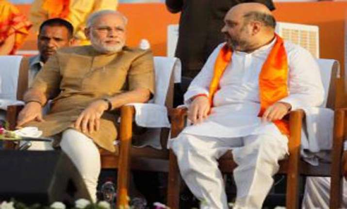 bjp appoints modi s confidante amit shah as up in charge