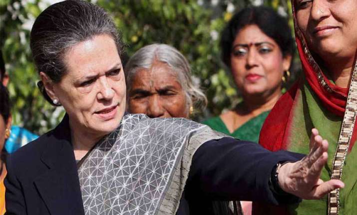 bjp dancing to tunes of extremist rss sonia gandhi
